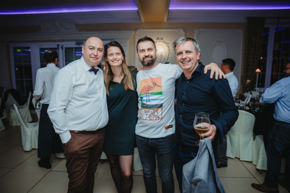 A couple of conTeyor colleagues posing for a group picture