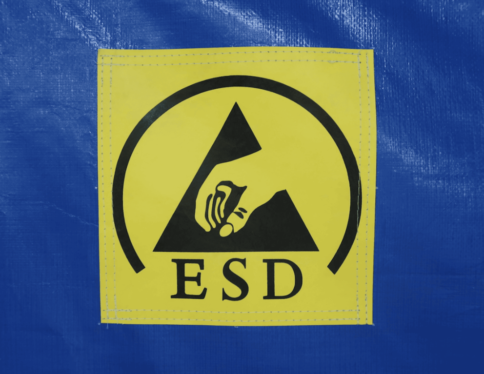 A close up of a yellow danger sign with the letters &quot;ESD&quot; on it.