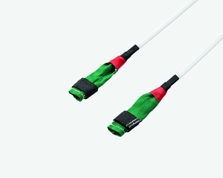 Two custom green sleeves with red and black accents
